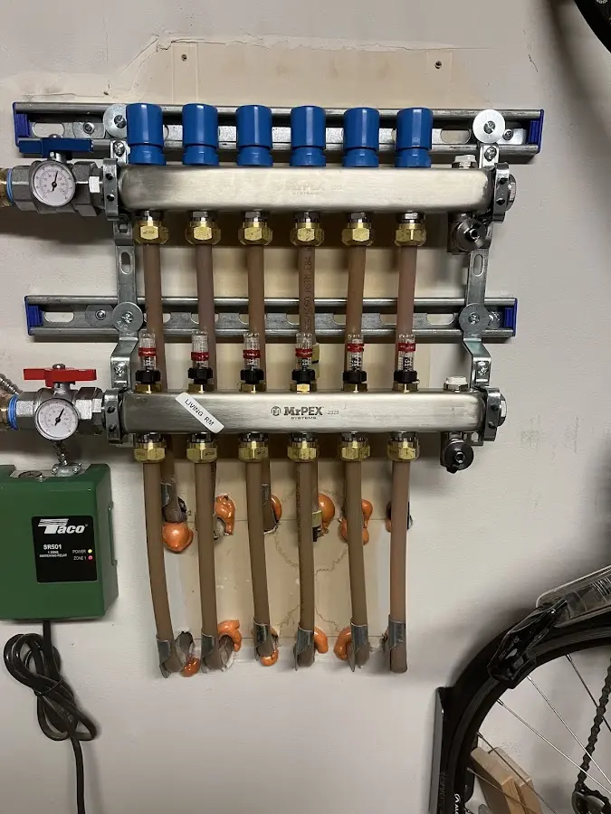 Plumber performing Water Heater Repair at a residential property in Bucyrus